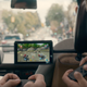 Two players use one Joy-Con each to play Mario Kart 8